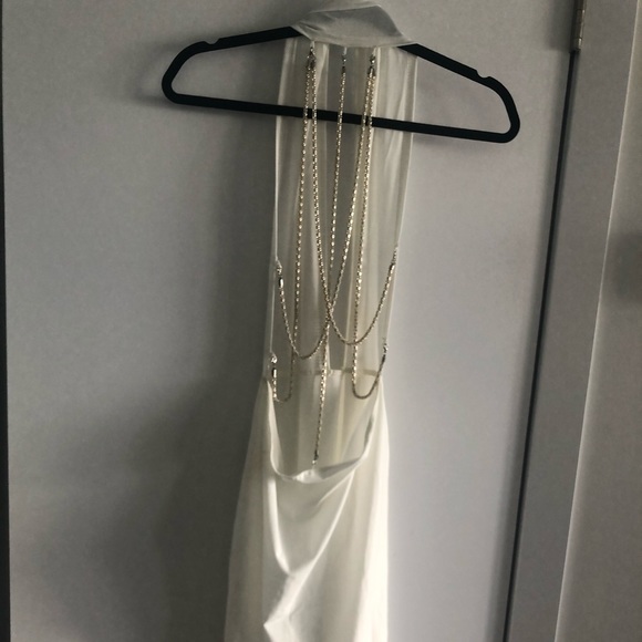 FREE white backless dress with any other purchase - Picture 1 of 3